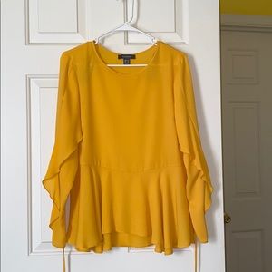 Yellow blouse with flowy sleeves